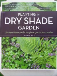 Book cover of Planting the Dry Shade Garden by Graham Rice